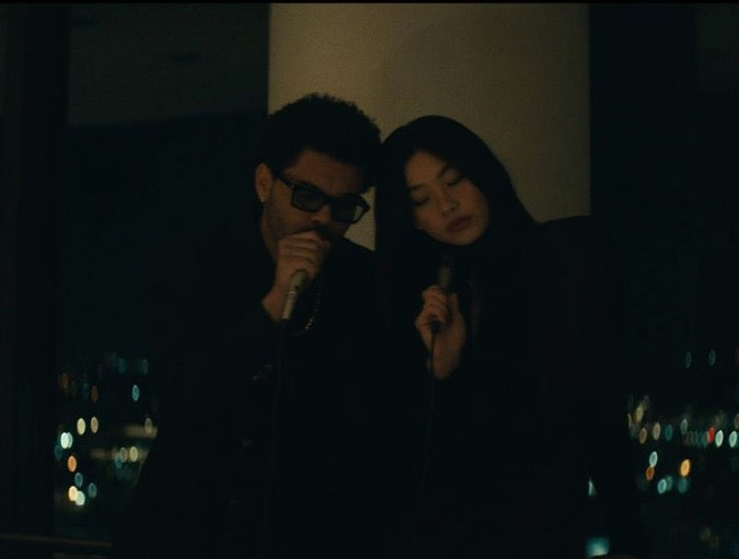 The Weeknd Drops Chilling ‘Out of Time’ Video Starring Jim Carrey & ‘Squid Game’s HoYeon Jung (Billboard)